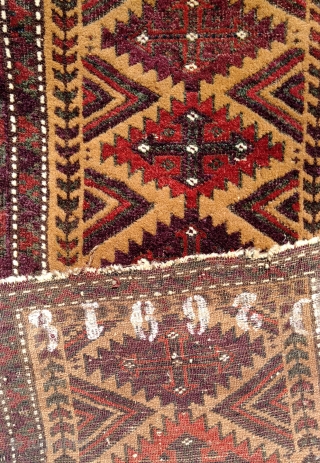 Antique camel field balisht with richly saturated aubergine, madder and emerald green which in places has oxidized. Wear at the margins and a split have not marred the impact of the wool  ...