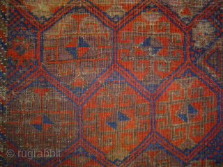 Early Baluch Guls in Hexagon lattice small rug with heavy even wear. Viewed on the verso it can be enjoyed as a flatweave. USD 325.- includes shipping in the U.S. Please check  ...