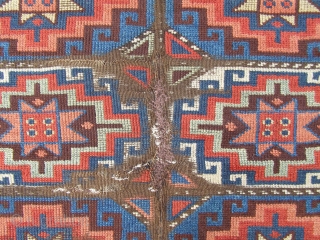 An East Anatolian 'Memling Gul' rug, probably mid 19th century, 245 x 111cm.  Deep, saturated colours.  Corroded brown and some damage.   Feels early.      