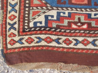 An East Anatolian 'Memling Gul' rug, probably mid 19th century, 245 x 111cm.  Deep, saturated colours.  Corroded brown and some damage.   Feels early.      