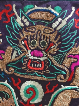 In the embroidery of the colorful Dragon Robe of the Qing Dynasty, a front five clawed dragon is embroidered with gold thread in the middle. Below it is Jiangya sea water. There  ...