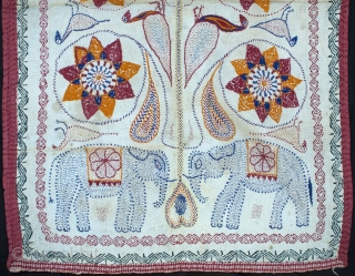 A multicolor Sujni kantha quilt from the Bengal,Asia. This beautiful piece is an embroidered ceremonial wrap done with cotton thread in red, blue and yellow and black border, with a white running  ...