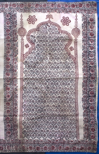 A Janamaz(prayer mat) with block printing on cotton probably from khandesh (Burhanpur-central India).

Period: Late 19th/Early 20th C.
Size  : 197 X 111 cms          