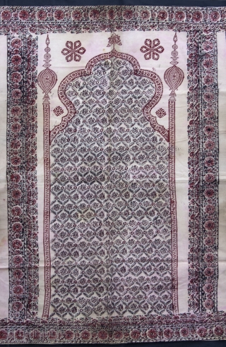 A Janamaz(prayer mat) with block printing on cotton probably from khandesh (Burhanpur-central India).

Period: Late 19th/Early 20th C.
Size  : 197 X 111 cms          