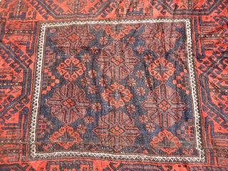 Baluch Rug fragment made a square bag face or Sitting Rug,early age,all natural colors,beautiful desigen.Size 3'3"*3ft.E.mail for more info and pics.            