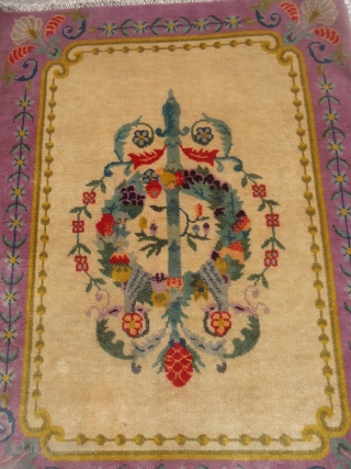 Beautiful ivory ground chinese rug with nice colors and design,excellent condition.Size 3'7"*2'9".E.mail for more info and pics.                