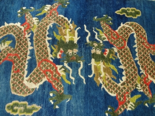 Beautiful blue ground chinese dragon rug with great colors and shiny wool.Good condition and design.Size 5'7"*3ft.E.mail for more info and pics.            