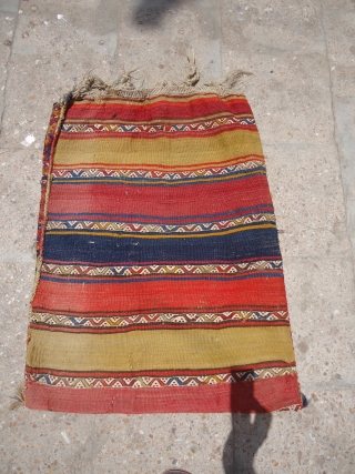 Juicey Anatolian Heybey or Grain Bag,with beautiful colors and fine weave,very nice desigen,good age,beautiful striped kilim backing.Size 2'8"*2'.E.mail for more info and pics.          