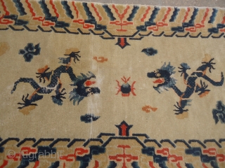 Chinese Dragon Rug with Ivory Groud,without any work or repair done,good age and colors.Size 6'*3'3".E.mail for more info and pics.             