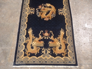 Chinese Rug with five dragons,beautiful colors and nicely drawn blue ground,excellent condition,without any repair or work done.All good colors,fine weave,Size 4'6"*2'4".E.mail for more info and pics.       