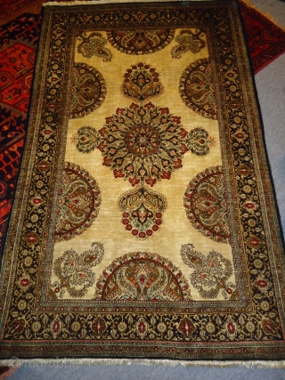 Ivory Ground Silk Persian Rug,beautiful colours and desigen,good condition.100 % Silk on Silk.Size 5'8"*3'7".Email for more info.                