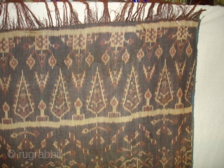 Finely dyed and woven warp ikat shawl from Nggela,Flores in Eastern Indonesia.Patola inspired design.Its size is 120cmX225cm(DSC02448 New).               