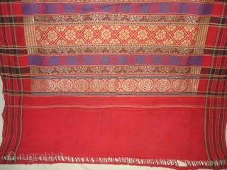 Temple Sari From Orissa, an eastern state India,on the Bay of Bengal.Sari is made of red cotton bordered by black stripes,the plain weave supplemented by bands of both warp and weft.Its size  ...