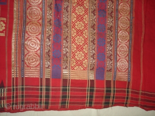 Temple Sari From Orissa, an eastern state India,on the Bay of Bengal.Sari is made of red cotton bordered by black stripes,the plain weave supplemented by bands of both warp and weft.Its size  ...