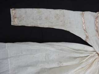 Angarkha(Coat)Man's Costume fine Muslin Cotton with Gota Pati and Badala work,with front opening,with large skirt shape, From Lucknow ,Utter Pradesh. India.C.1900.Worn by Royal Nawab Muslims Family Of Lucknow.Its size is L-150cm,S-16X62cm,Skirt circle  ...