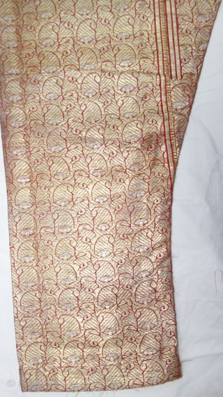 Ejar (Trouser) Zari Brocade (Gold Plated Real Silver Threads) On Gajji-Silk, Probably from the Deccan Region of South India. India. 19th Century. 
Its size is Length - 17cm x 91cm Width- 145  ...