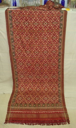 Patola Sari Silk Double ikat.Probably Patan Gujarat.India.19th Century.this Patola sari has the type of geometric,non figurative pattern particularly favoured by the ismaili Muslim merchant community of the Vohras.and its called Vohra-Gaji-Bhat.(Vohra Type  ...