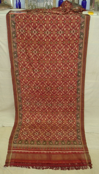 Patola Sari Silk Double ikat.Probably Patan Gujarat.India.19th Century.this Patola sari has the type of geometric,non figurative pattern particularly favoured by the ismaili Muslim merchant community of the Vohras.and its called Vohra-Gaji-Bhat.(Vohra Type  ...