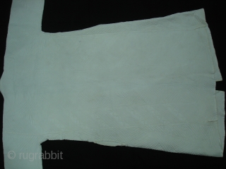 White Vohra Costume(Cotton)from Gujarat India.Made for who offer’s Namaz in mosque.Every Part is quilted inside with Portly thread. Its size,Arm is 70cm,Height is 115cm,Skirt is 135cm. Its very rare piece to find.  ...