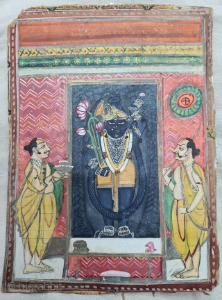 Miniature Painting of Mangala Darshan of Shrinathji  with Lahariya Design. From The Nathdwara of Rajasthan. India. Mangala Darshan  is the First darshan of the day. Lord, having woken up, has just had His breakfast and greets  ...
