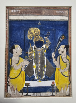 An Rare Miniature Painting of Shrinathji with devotees Doing Pooja Ceremony.

From The Nathdwara
Rajasthan. India.

Opaque watercolor on paper With Gold Work.

C.1875 - 1900

Its size is 5" Inches X 7" Inch (20240616_154610).   