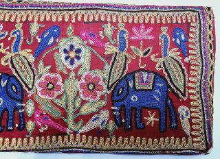 Mochi Bharat Embroidery Book Cover, Silk Embroidery on the Satin Silk, From Kutch, Gujarat. India.

Showing the Large elephants Standing both sides of Floral Tree with Peacocks and Brids.

C.1875 - 1900

Its size is  ...