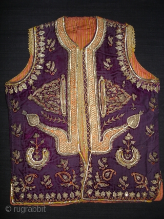 Man’s waistcoat(Sadri/Bandi)From Hyderabad,South India.Cotton velvet,embroidered with silver and gold-wrapped thread,L 51cm x w 41cm.Condition is worn from back side(DSC06336 New).             