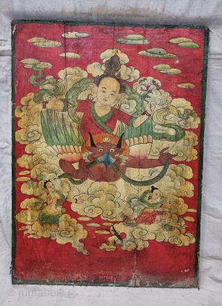 Dramatically Tibetan Buddhist Hand Painted Wood Panel

depicting symbols of Tibetan mythology such as Tigers Dragons and Lamas From Tibet.

C.1875-1900.

Its size is 58cmX80cm(20220802_163448).           