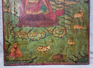 Dramatically Tibetan Buddhist Hand Painted Wood Panel

depicting symbols of Tibetan mythology such as Tigers Dragons and Lamas From Tibet.

C.1875-1900.

Its size is 67cmX90cm (20220802_164202).          