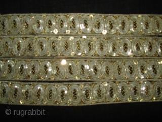 Parsee Zari(Real Silver)Lace Border From Surat Gujarat India.This kind of Lace Border were embroidered by Gujarati artisans in the town of Surat in Gujarat for the Parsee women of that region.The Parsee's  ...