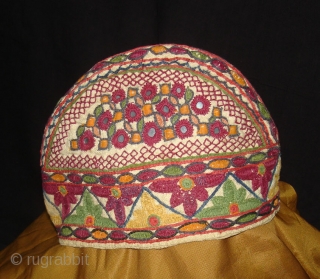 Ceremonial Baby's Cap(Topi),From Tharparkar Pakistan. Belongs to Sodha Rajput Group.C.1900.Cotton embroidered on the cotton(DSC09039 New).
                  