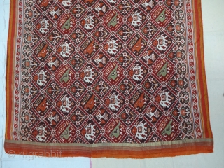 Nari Kunj Patola Saree, Silk Double Ikat, Probably Patan Gujarat. India.This Patola uses one of the rarest designs, known as Nari Kunj Patola. This Patola is showing Nari Kunjar Bhat, Popat Kunjar  ...