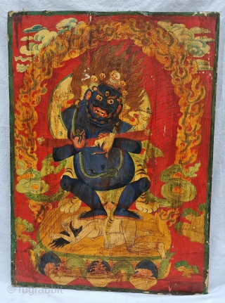 Dramatically Tibetan Buddhist Hand Painted Wood Panel depicting symbols of Tibetan mythology such as Tigers Dragons and Lamas From Tibet. C.1875-1900. Its size is 59cmX80cm (20220831_161648).       