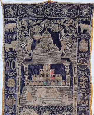 A Rare Jain Temple Hanging, From Gujarat in Northwest India. India

Its size is 77cmX132cm.

Weight is 2 Kgs 090 Gm

C.1900.- 1945.

This form of embroidery is called zardosi work. A Indigo Blue  velvet cloth has been  ...
