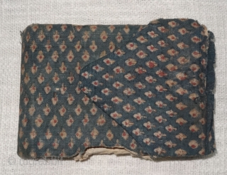 Holy Book of mythology, written in devanagari lipi on the paper, Khadi Cotton On Indigo base colour with flower design,From Rajasthan. India.Circa 1900.Its size is 14cmx55cm(DDSC07087).
       