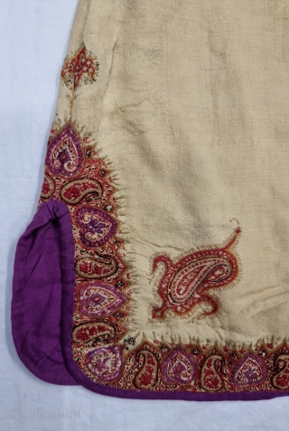 A Kashmir Embroidery Jacket-Waist Coat, Borders with Keri butis, From Kashmir, India. India. 

The front and similar motifs on the sleeves, The back and Shoulders are Decorated with Elaborate Keri Butas..

C.1875 -1900.  ...