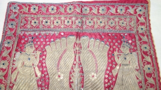 A Gujarat Silk Wall Hanging Puthia  Depicting the Feet of aJain Monk,  From Gujarat, India. Real Zari (Gold and Silver ) Embroidery on the Silk.

The presence of the holy teacher  ...