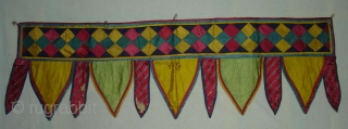 Patch work(Gajji-Silk)Toran from Kutch Gujarat India.This were Traditionally used mainly Jain Derasar Temples of Gujarat India.Backing with Manchester Print.C.1900.Its size is 30cmX102cm(DSC05704 New).          