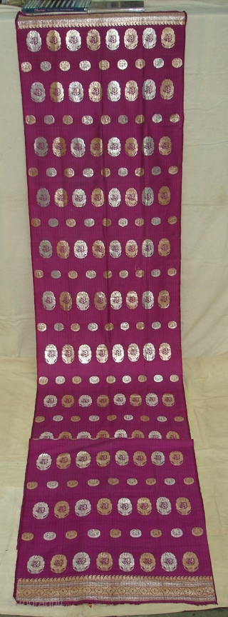 Zari(Real)Brocade Yardage Or Turban with Arabic Writing with Ganga Jamana(Gold And Silver Weaving)Work from Hyderabad, Deccan Area India, India. C.1900.Its size is 75cm X 440cm.Condition is perfect(DSC05990 New).
     