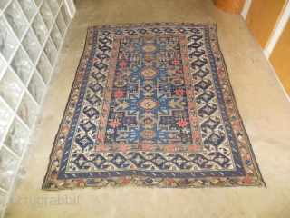 Early 20th Century Lesghi Star Caucasian 3'11" x 5'3." Lovely blue colors and mix of natural and some synthetic dyes, but no color run. Very interesting and unusal major border. Wear and  ...