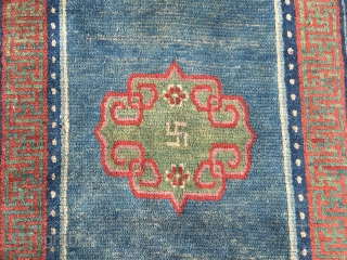 Antique Tibetan khaden rug, 1850-1875. In good condition and with lovely colours.                     