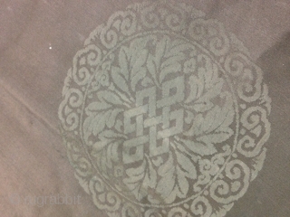 A female Tibetan Chuba (Female Robe), made from Chinese damask brocade silk in subtle gray color. Brocade motif is roundles of interlaced Ruyi, foliage  with endless knot in the center.Inside lined  ...