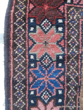 RARE AFGHAN PRAYER RUG. The contents of the field make this an extraordinary and rare piece. At the top there are depictions of two pendants known as "tumar". These are sometimes attached  ...