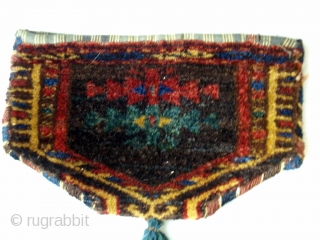 www.oldorientalcarpet.com TURKOMAN TRIBAL BAG This was probably used as a purse and is composed of two Yamut camel knee decorations which have been joined together with overcasting of the same colour as  ...