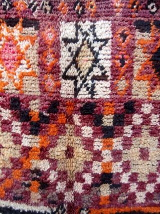 MOROCCAN BERBER TRIBAL RUG. This is an old piece from the Beni Sadden Berbers, a small group who live in the eastern section of the Middle Atlas Mountains east of the city  ...