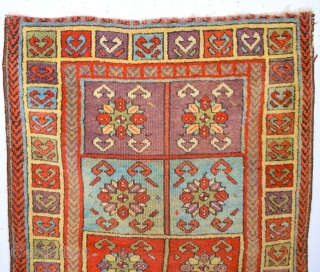 19th Century Central Anatolian Sivas Yastık In this example the confronting bird's head motif is used in the main borders as well as in the field and the chevron border also reappears.  ...