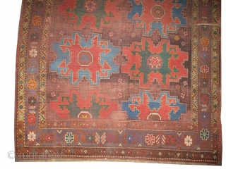 
	

Star Kazak Caucasian, knotted circa in 1870 antique, collector's item, 180 x 147 (cm) 5' 11" x 4' 10"  carpet ID: K-4036
Part of the oxidized brown knots is worn. The knots,  ...