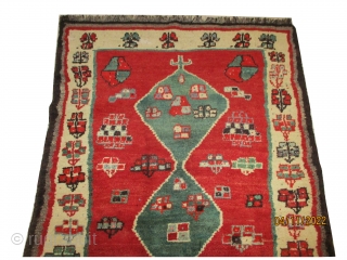 
Gabbeh Nomad knotted circa in 1928 semi antique, collectors item, 188 x 130 cm  carpet ID: T-711

The knots are hand spun wool, the black knots are oxidized, the warp and the  ...