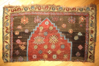 Fragment of old Kurdish weaving with captivating design of an archaic stepped arch form on a spare field, original selvages; 3rd quarter 19c; 3.5 feet Horiz. x 2.0 feet Vert. (104x61cm). Wonderful  ...