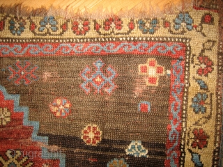 Fragment of old Kurdish weaving with captivating design of an archaic stepped arch form on a spare field, original selvages; 3rd quarter 19c; 3.5 feet Horiz. x 2.0 feet Vert. (104x61cm). Wonderful  ...